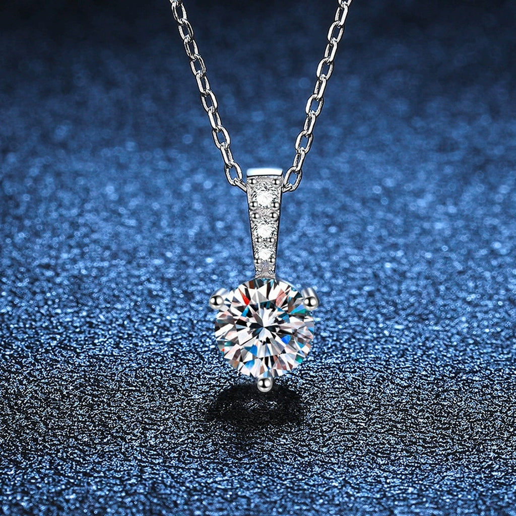 round moissanite pendant necklace with pavé bail detail view