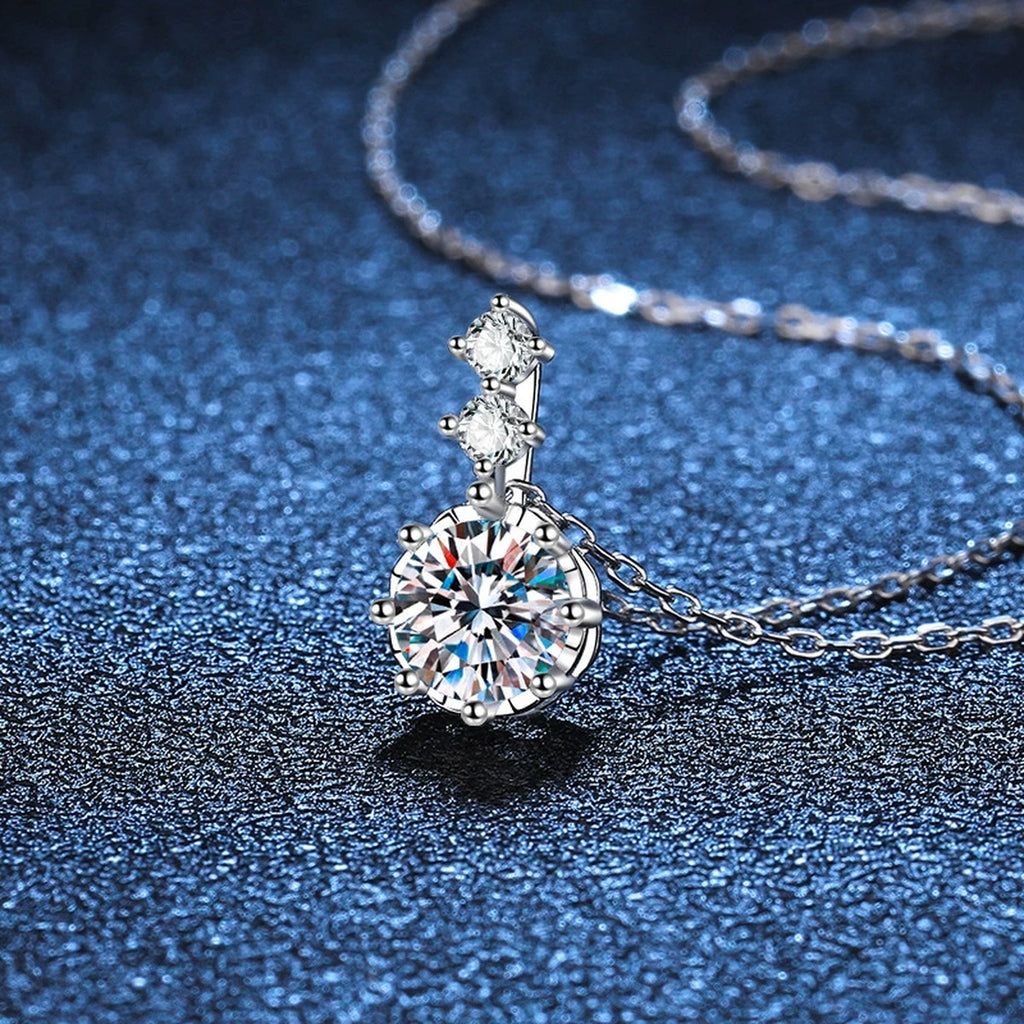 Round Moissanite Pendant Necklace with Cubic Zirconia in White Gold-Plated S925 Sterling Silver blue background product view