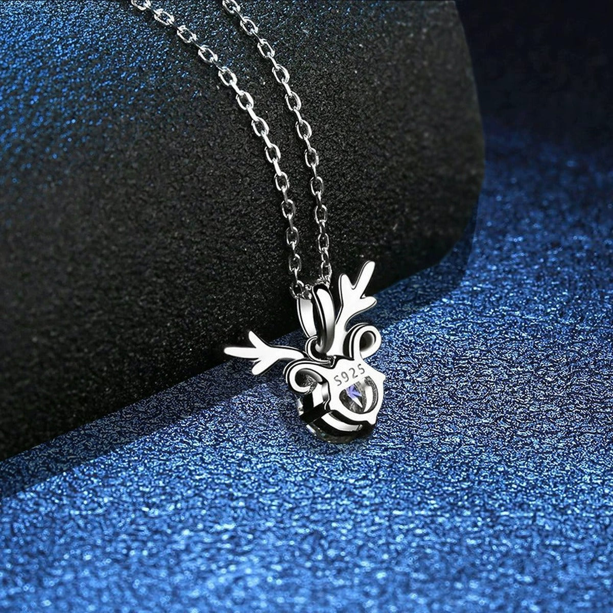 Round Halo Moissanite Pendant Necklace with Cubic Zirconia in White Gold-Plated S925 Sterling Silver blue background product view