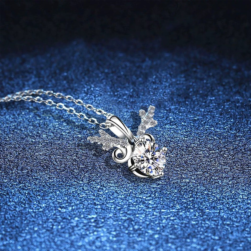 Round Halo Moissanite Pendant Necklace with Cubic Zirconia in White Gold-Plated S925 Sterling Silver blue background angled view