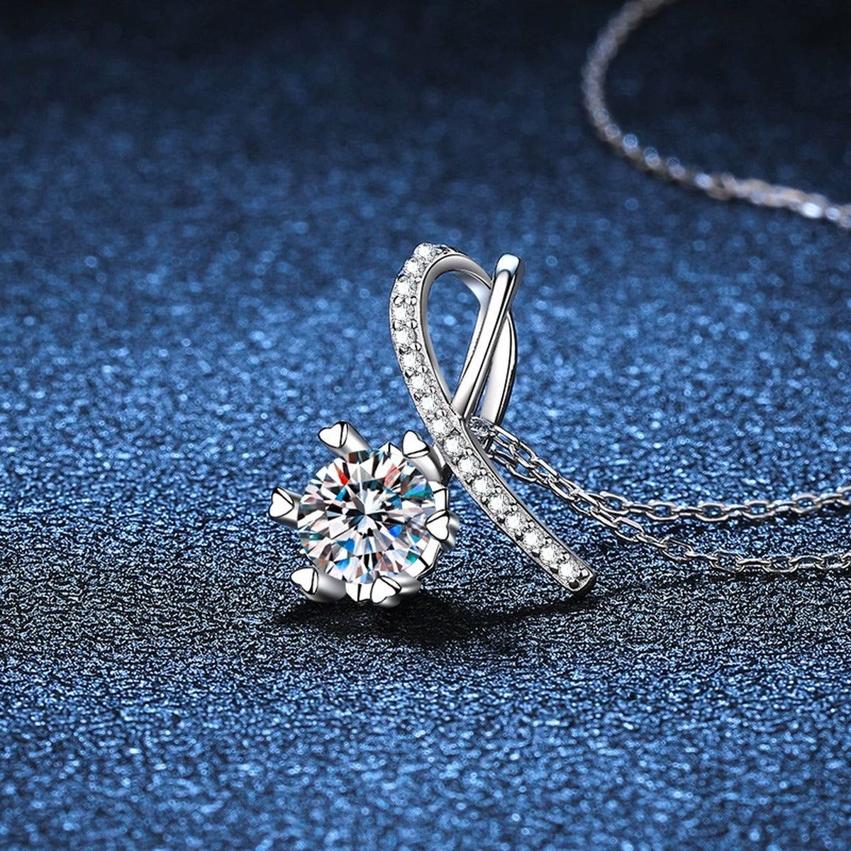 ribbon round moissanite pendant necklace with CZ accents in platinum-plated S925 sterling silver close-up detail view