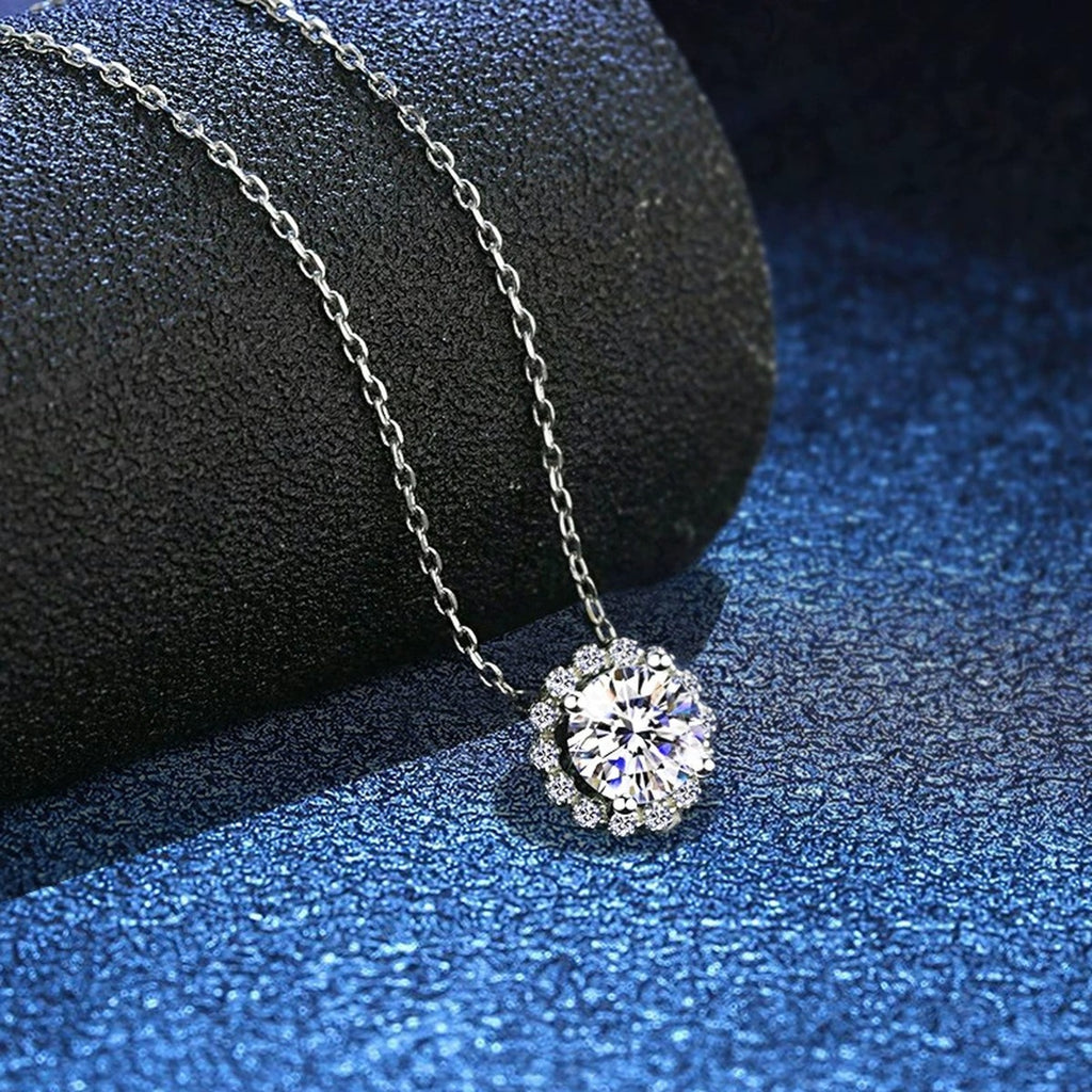 floral halo moissanite pendant necklace with CZ accents in platinum-plated S925 sterling silver lifestyle product view