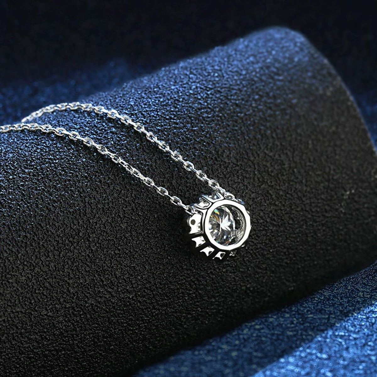 floral halo moissanite pendant necklace with CZ accents in platinum-plated S925 sterling silver close-up detail view
