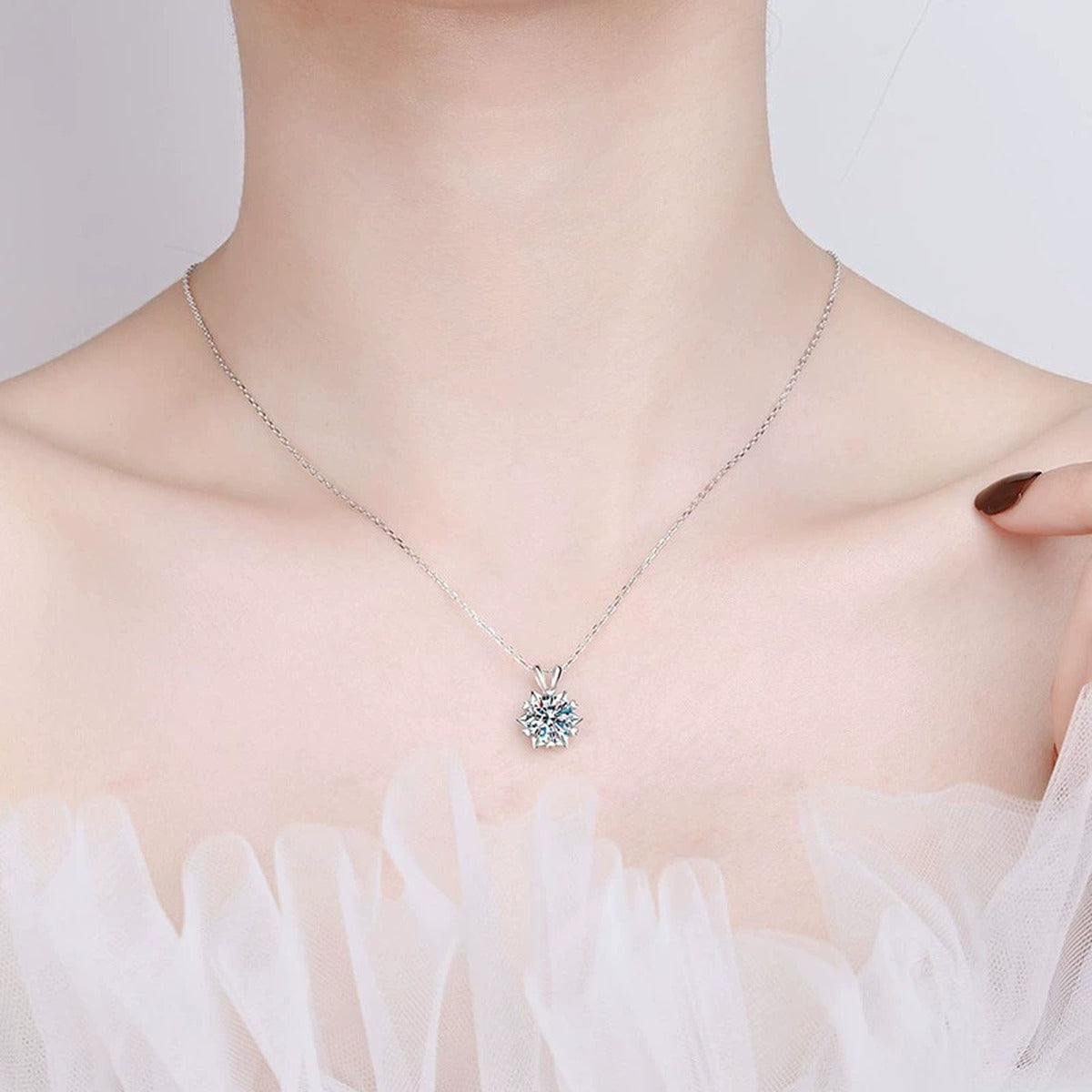 starburst moissanite pendant necklace in platinum-plated S925 sterling silver worn by model