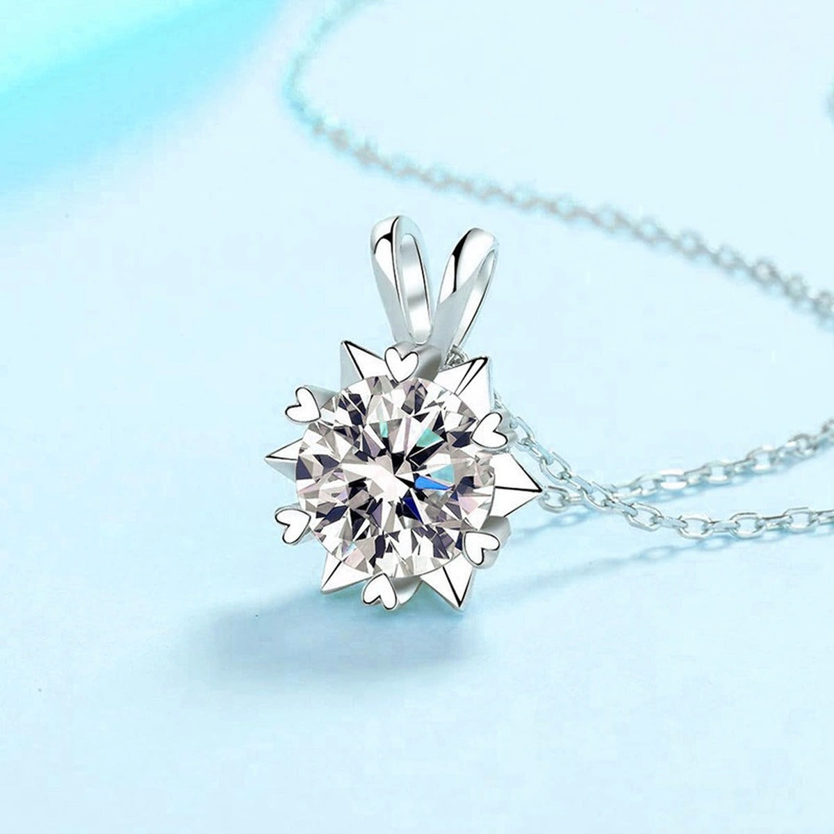 starburst moissanite pendant necklace in platinum-plated S925 sterling silver close-up detail view