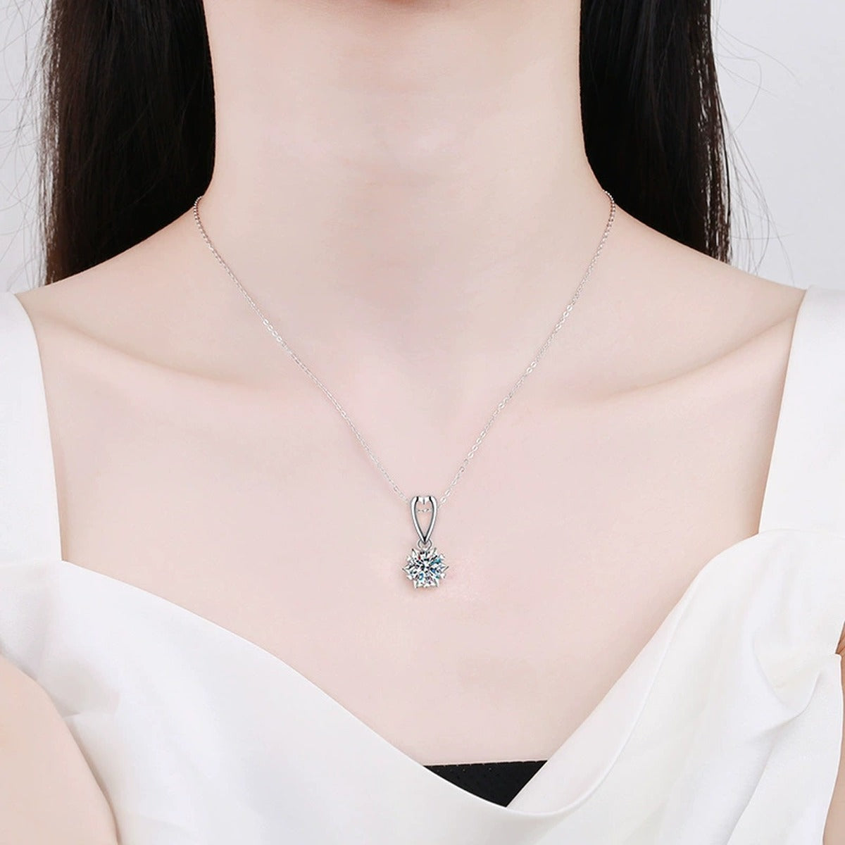 heart bail round moissanite pendant necklace in platinum-plated S925 sterling silver worn by model