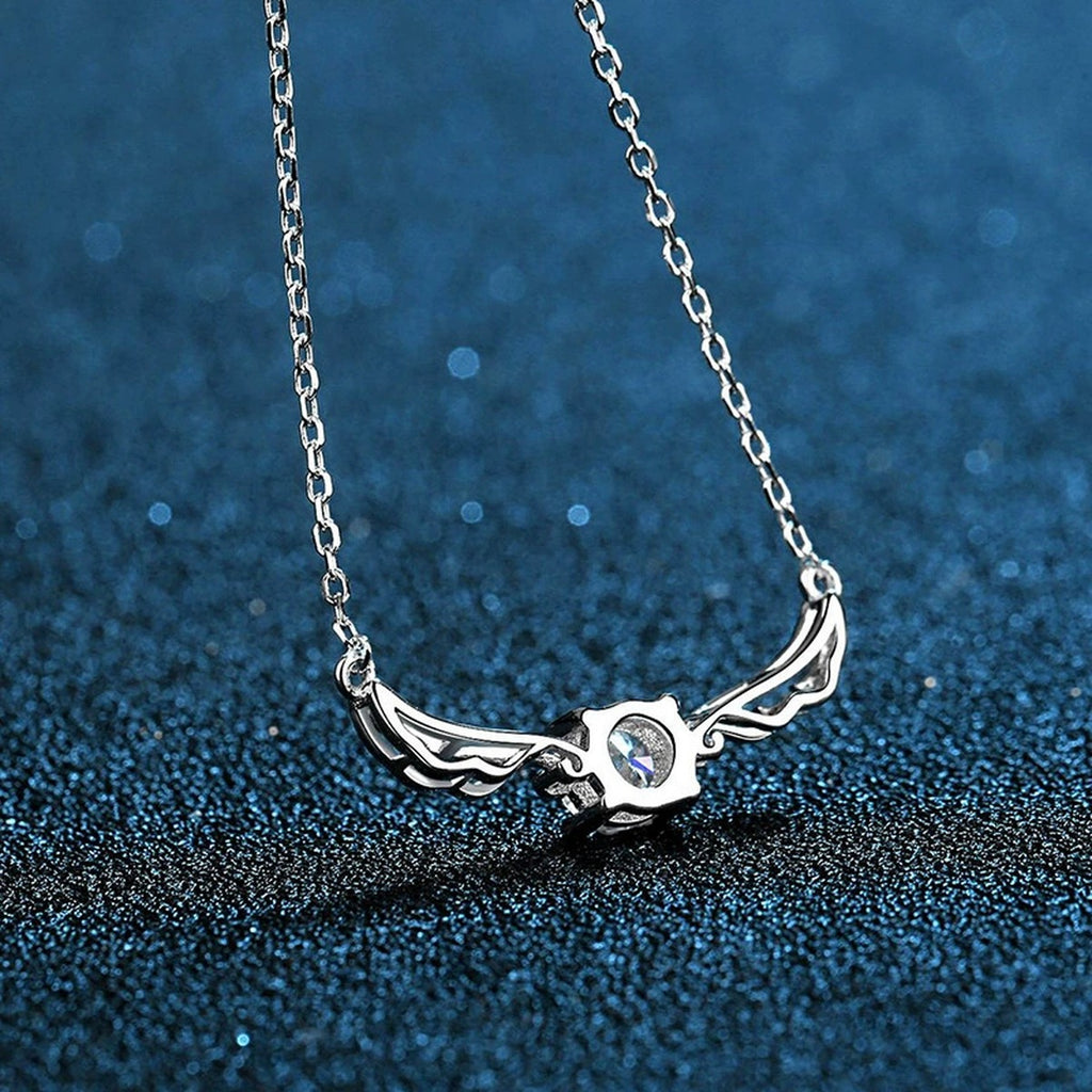 wing moissanite station necklace in platinum-plated S925 sterling silver close-up detail view