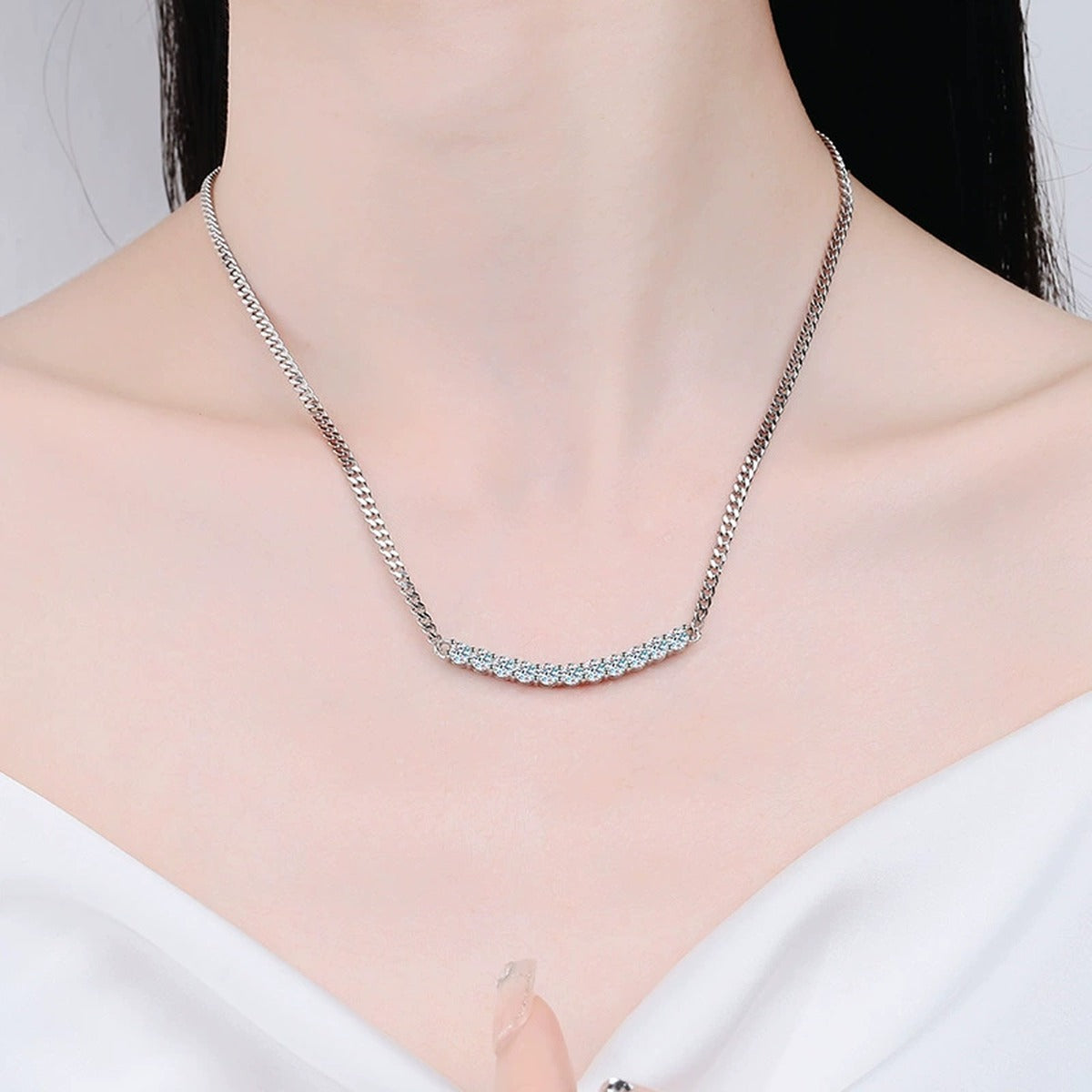 graduated moissanite collar necklace in platinum-plated S925 sterling silver worn by model