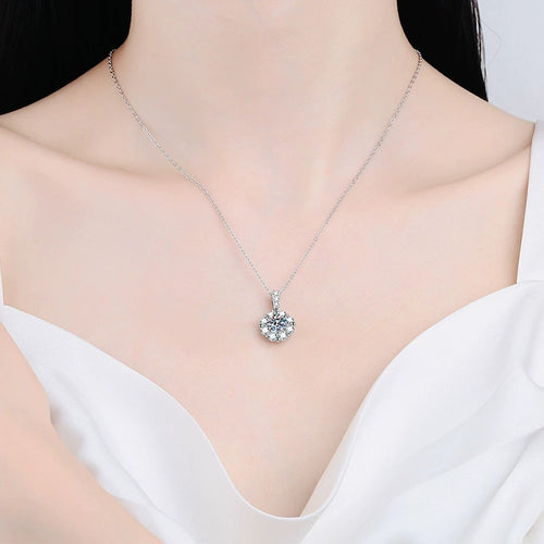 cluster halo moissanite pendant necklace with CZ accents in platinum-plated S925 sterling silver worn by model
