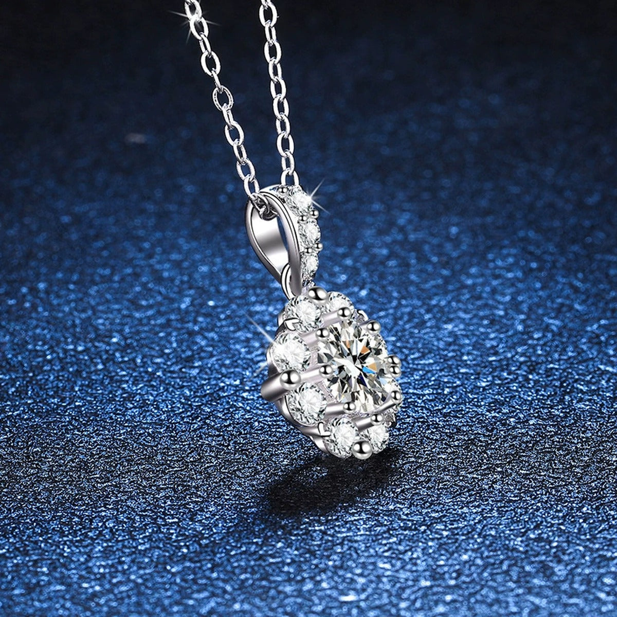 cluster halo moissanite pendant necklace with CZ accents in platinum-plated S925 sterling silver close-up detail view