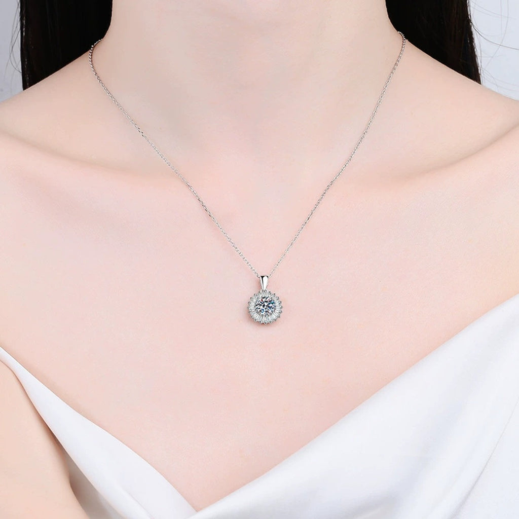 round halo moissanite pendant necklace with CZ accents in platinum-plated S925 sterling silver worn by model