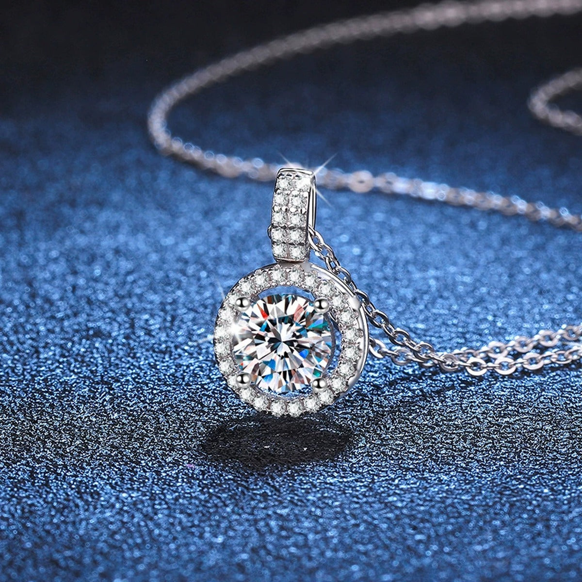 round halo moissanite pendant necklace with CZ accents in platinum-plated S925 sterling silver lifestyle product view