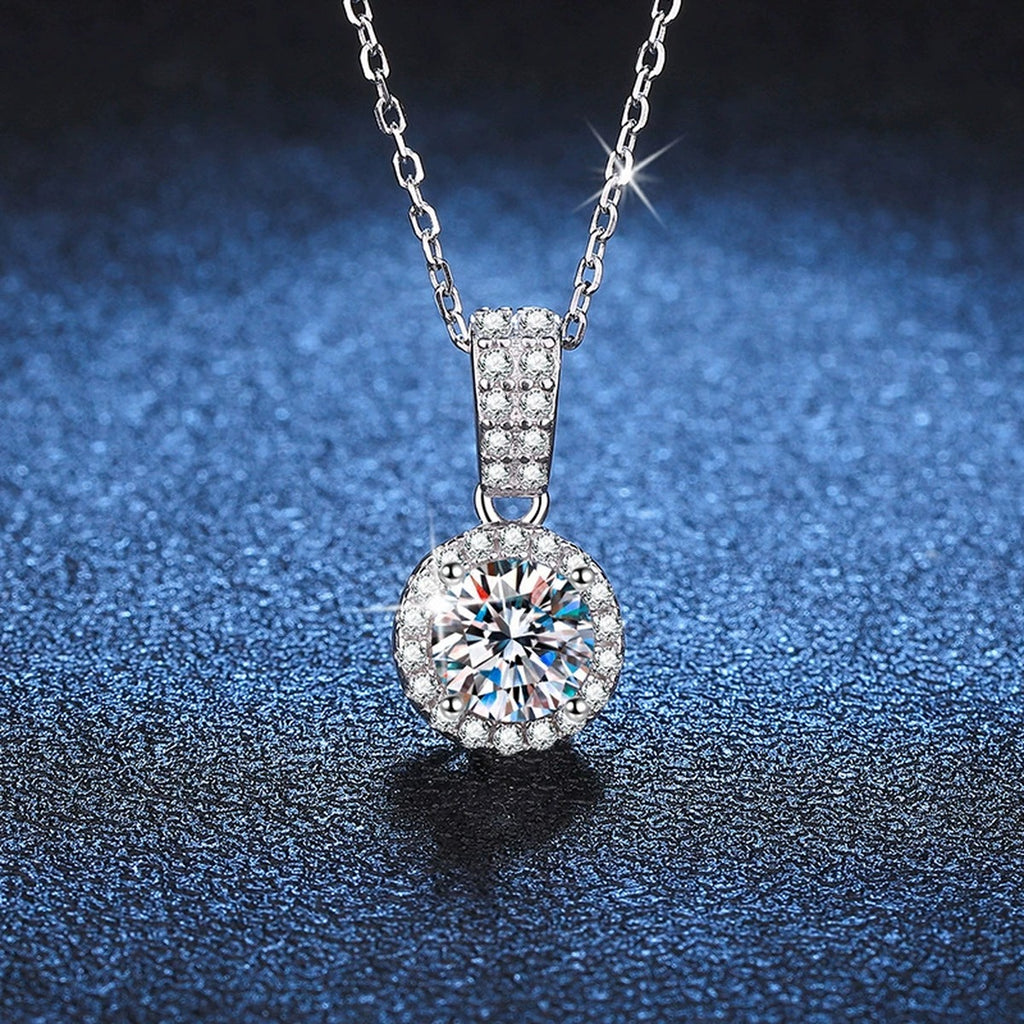 round halo moissanite pendant necklace with CZ accents in platinum-plated S925 sterling silver product detail view