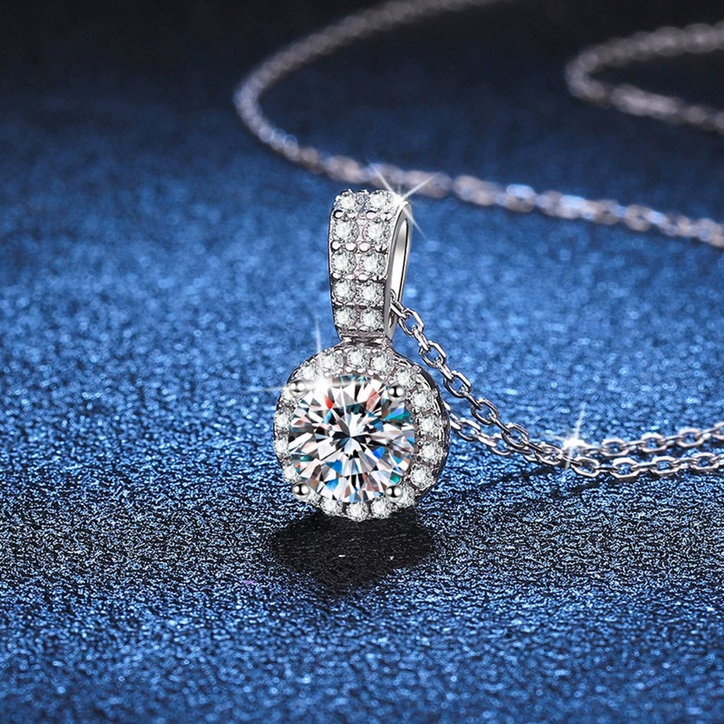 round halo moissanite pendant necklace with CZ accents in platinum-plated S925 sterling silver lifestyle product view