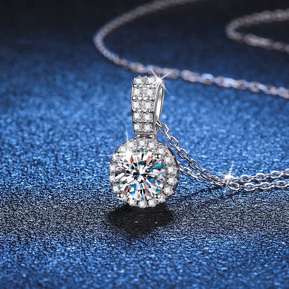round halo moissanite pendant necklace with CZ accents in platinum-plated S925 sterling silver lifestyle product view