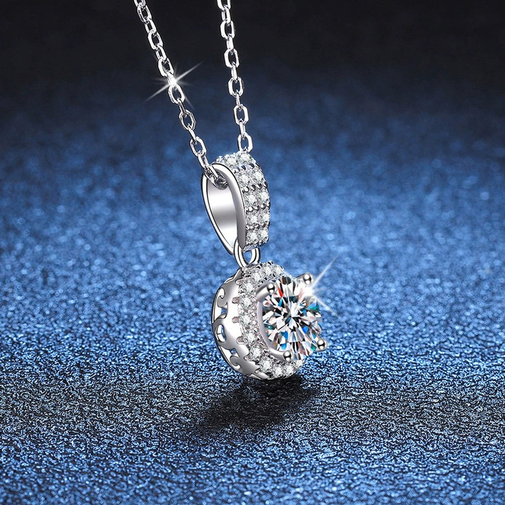 round halo moissanite pendant necklace with CZ accents in platinum-plated S925 sterling silver close-up detail view