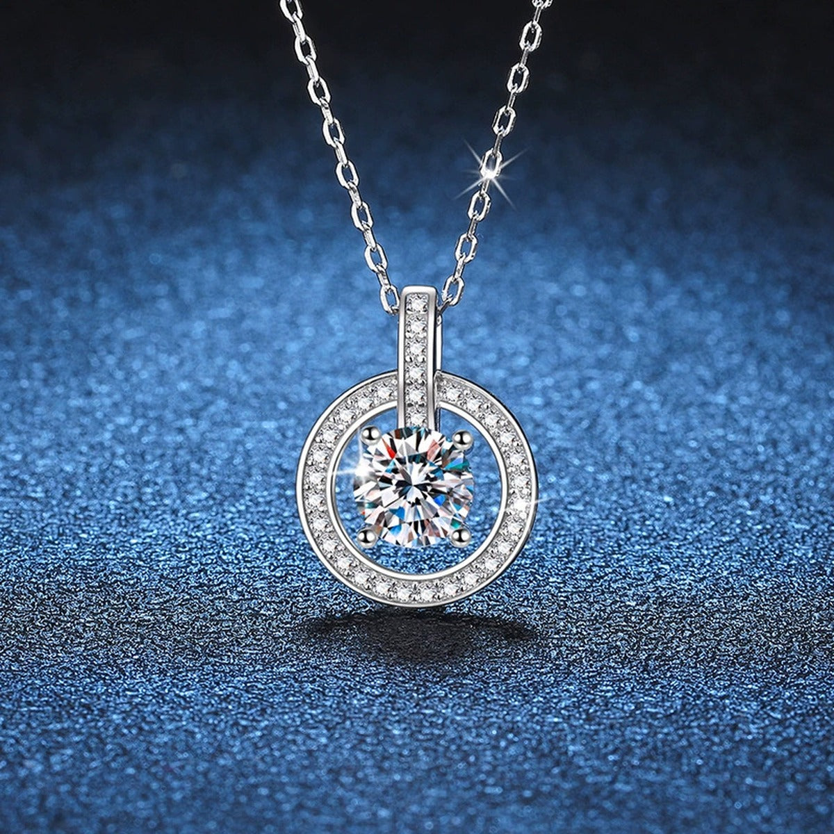 circle drop moissanite pendant necklace with CZ accents in platinum-plated S925 sterling silver product detail view