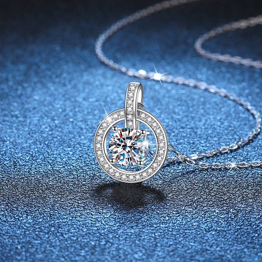 circle drop moissanite pendant necklace with CZ accents in platinum-plated S925 sterling silver lifestyle product view
