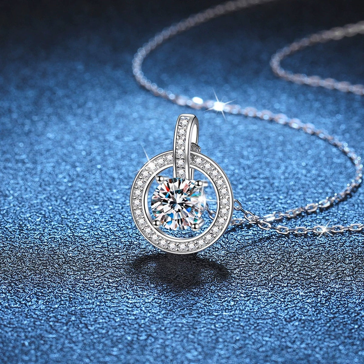 circle drop moissanite pendant necklace with CZ accents in platinum-plated S925 sterling silver lifestyle product view