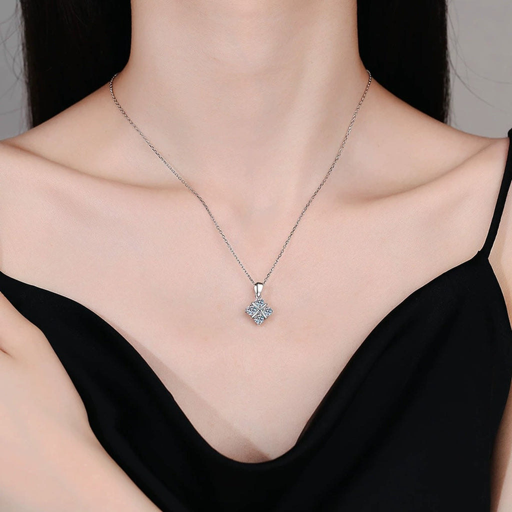 Four-Stone Clover Moissanite Pendant Necklace in Platinum-Plated S925 Sterling Silver worn by model at neckline