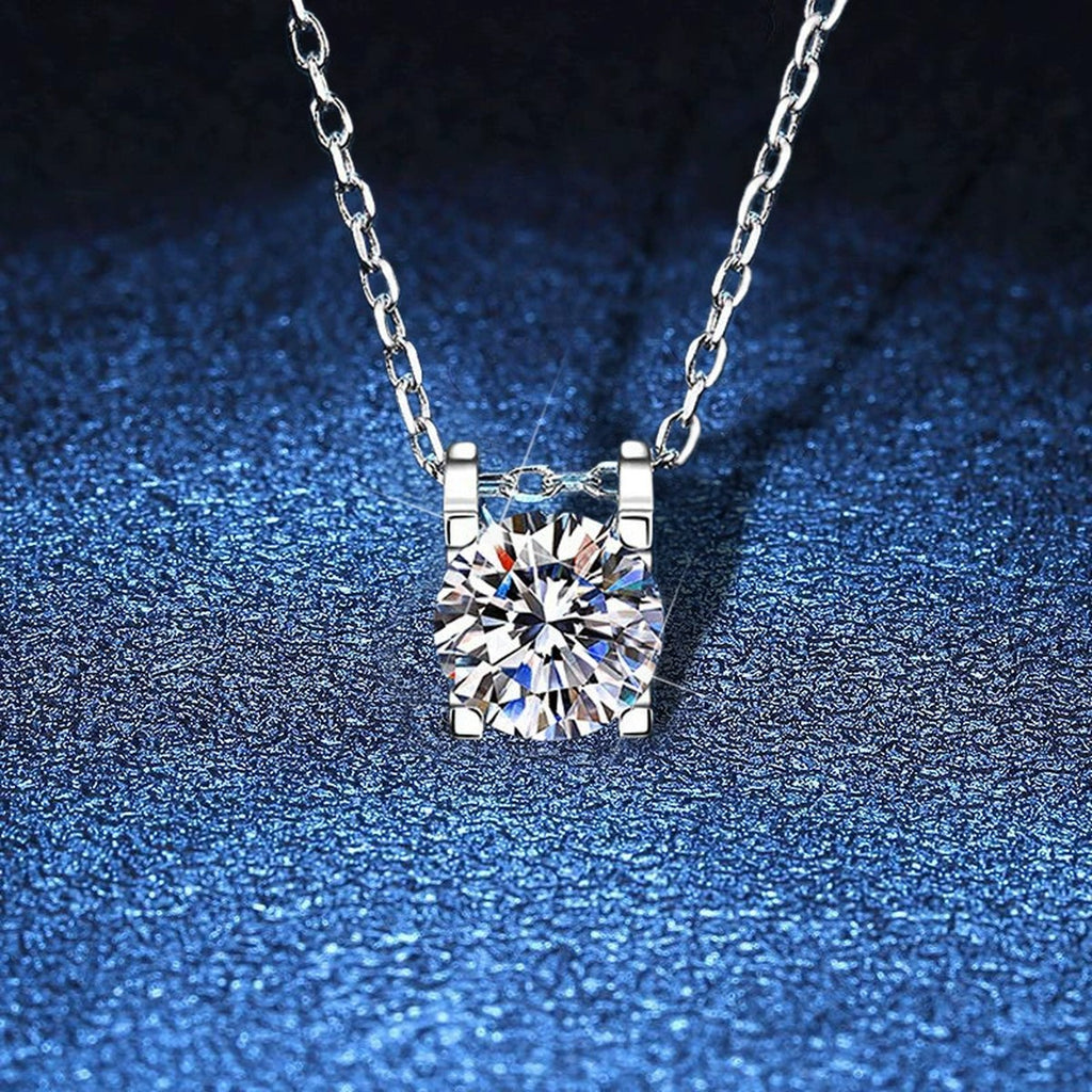 Round Moissanite Solitaire Pendant Necklace in White Gold-Plated S925 Sterling Silver blue background product view