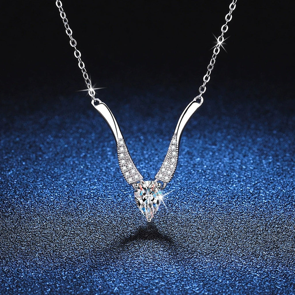 Pear Moissanite Drop Necklace in Platinum-Plated S925 Sterling Silver blue background product view