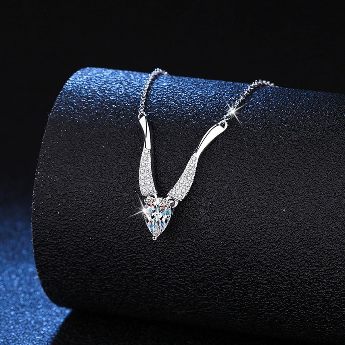 Pear Moissanite Drop Necklace in Platinum-Plated S925 Sterling Silver dark background product display view