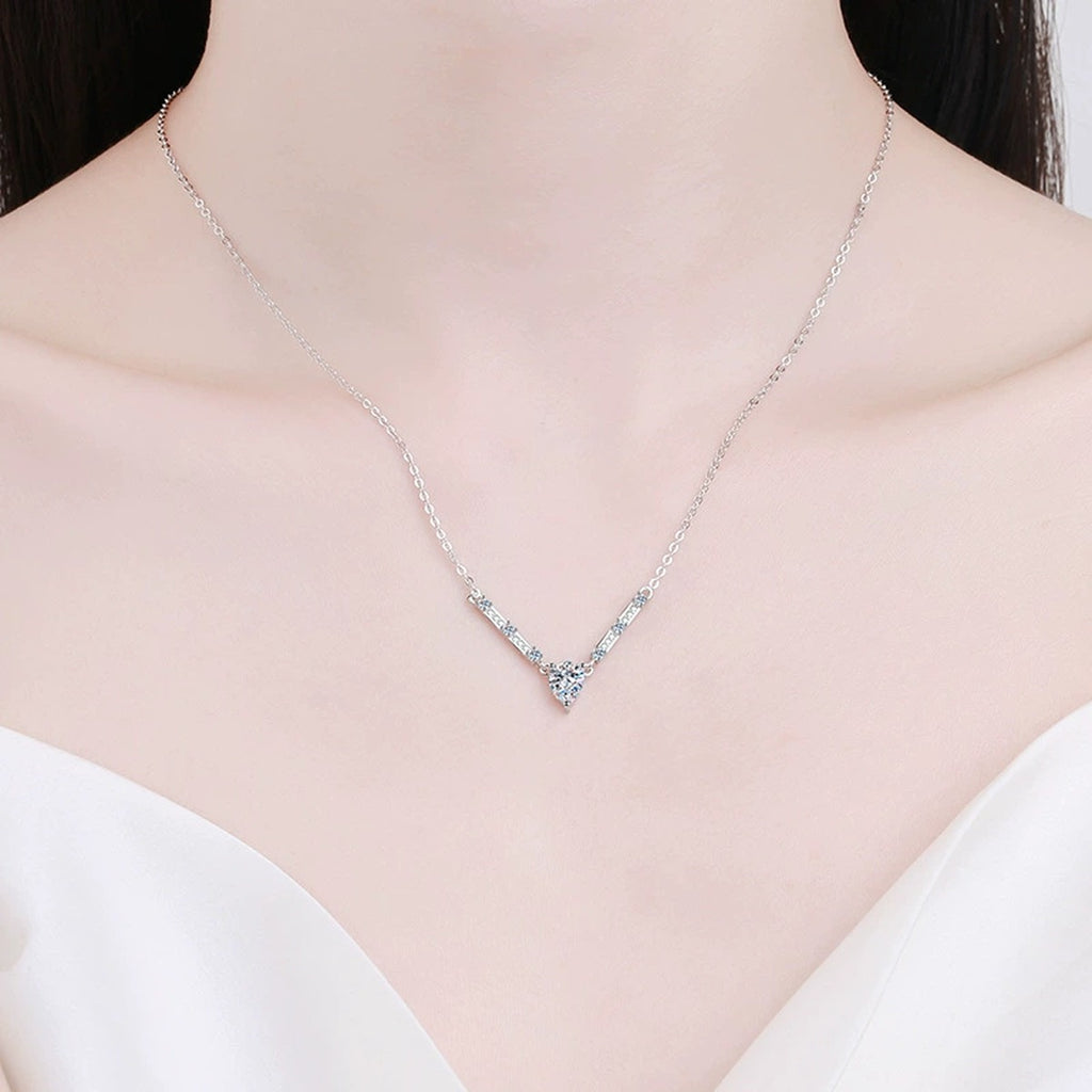 Pear Moissanite Bar Drop Necklace in Platinum-Plated S925 Sterling Silver worn on neckline by model