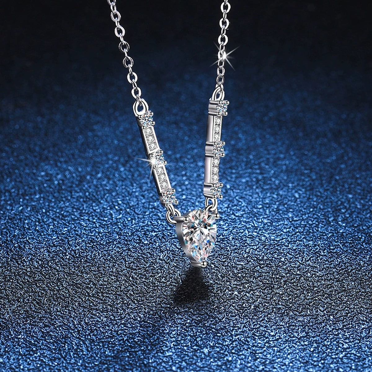 Pear Moissanite Bar Drop Necklace in Platinum-Plated S925 Sterling Silver blue background product view