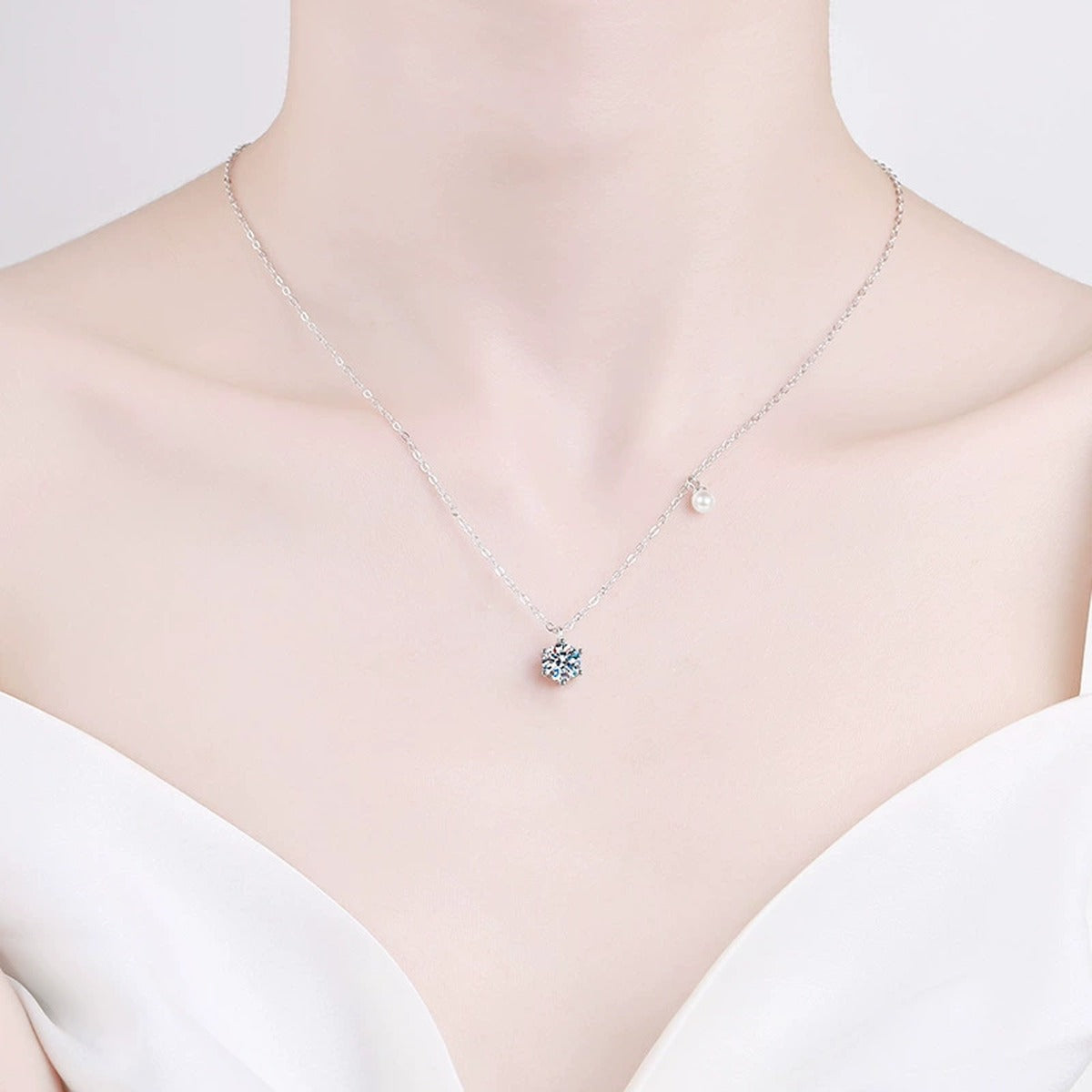 Round Moissanite Pearl Accent Pendant Necklace in Platinum-Plated S925 Sterling Silver wearing by a model on the neck
