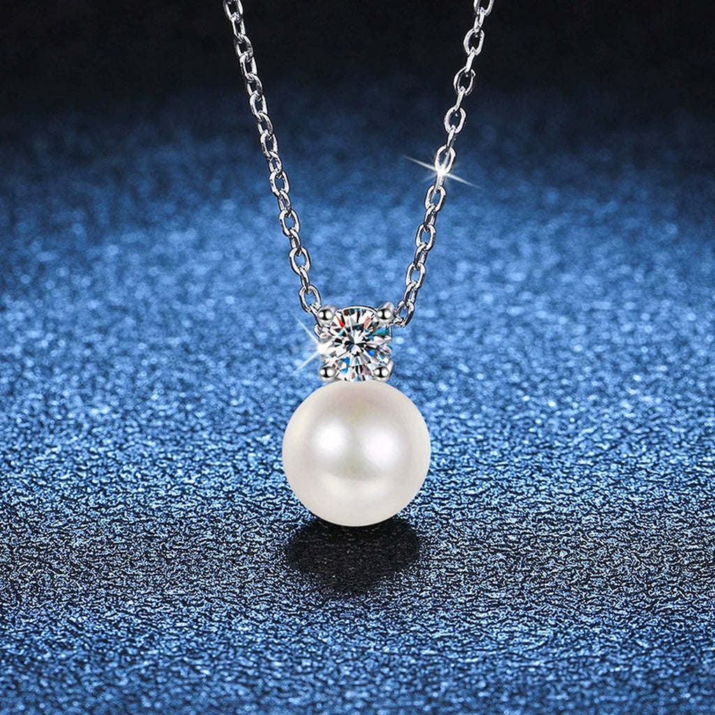 Petite Round Moissanite Pendant Necklace in Platinum-Plated S925 Sterling Silver blue background product view