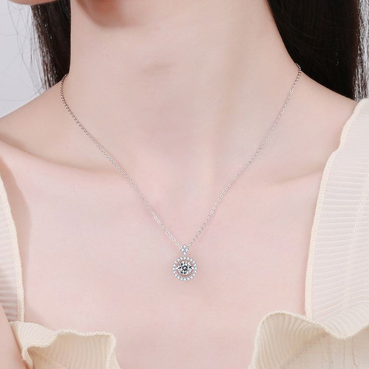 Round Halo Moissanite Pendant Necklace in Platinum-Plated S925 Sterling Silver worn on neckline by model