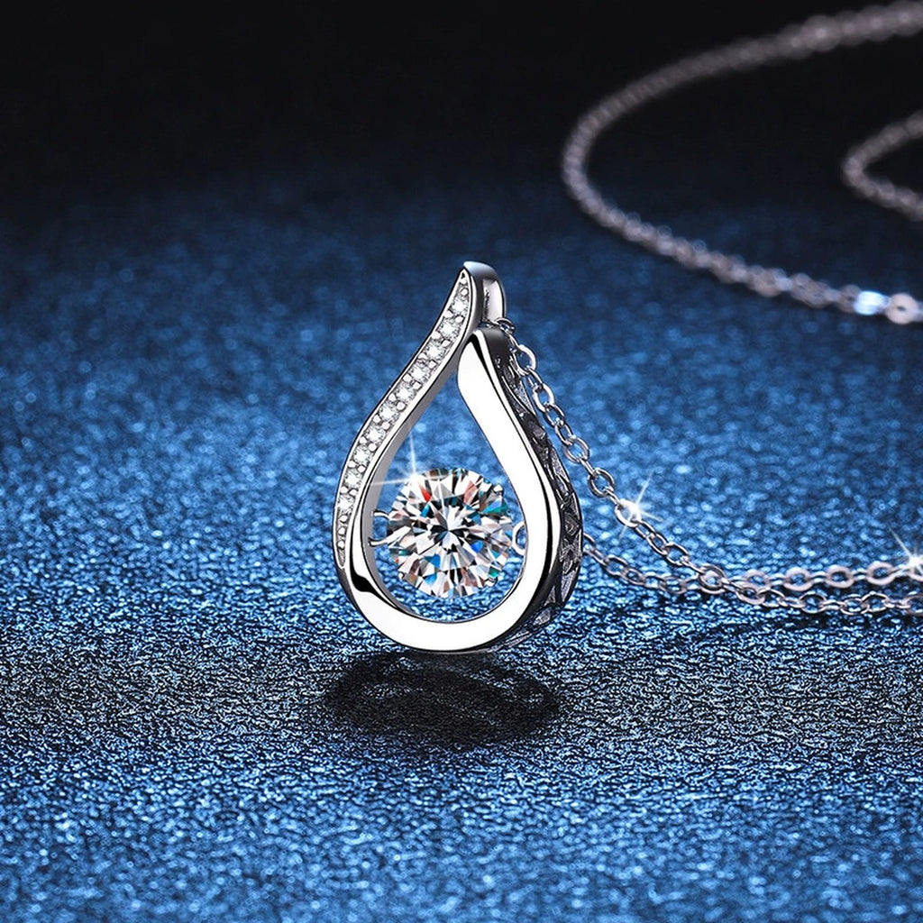 Teardrop Moissanite Pendant Necklace in Platinum-Plated S925 Sterling Silver blue background product view