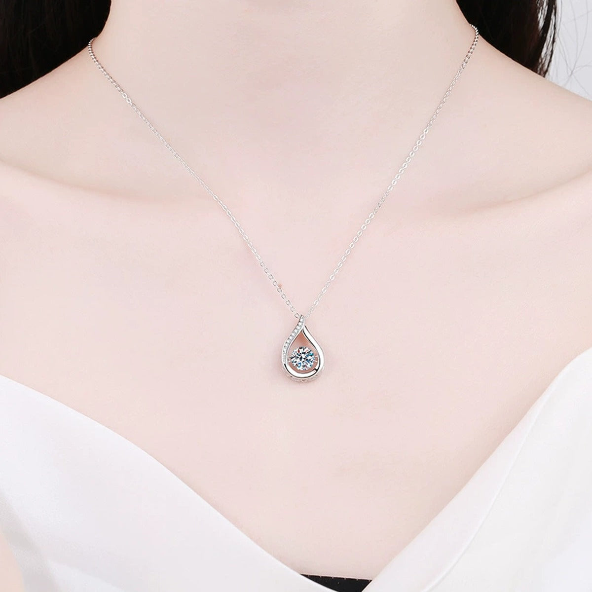 Teardrop Moissanite Pendant Necklace in Platinum-Plated S925 Sterling Silver close-up product detail view