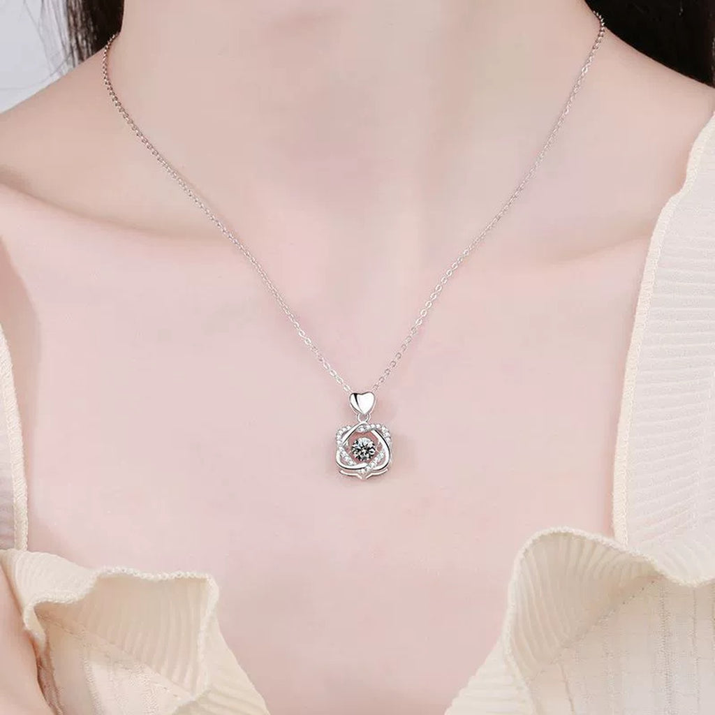 Floral Swirl Moissanite Pendant Necklace in Platinum-Plated S925 Sterling Silver worn by model at neckline
