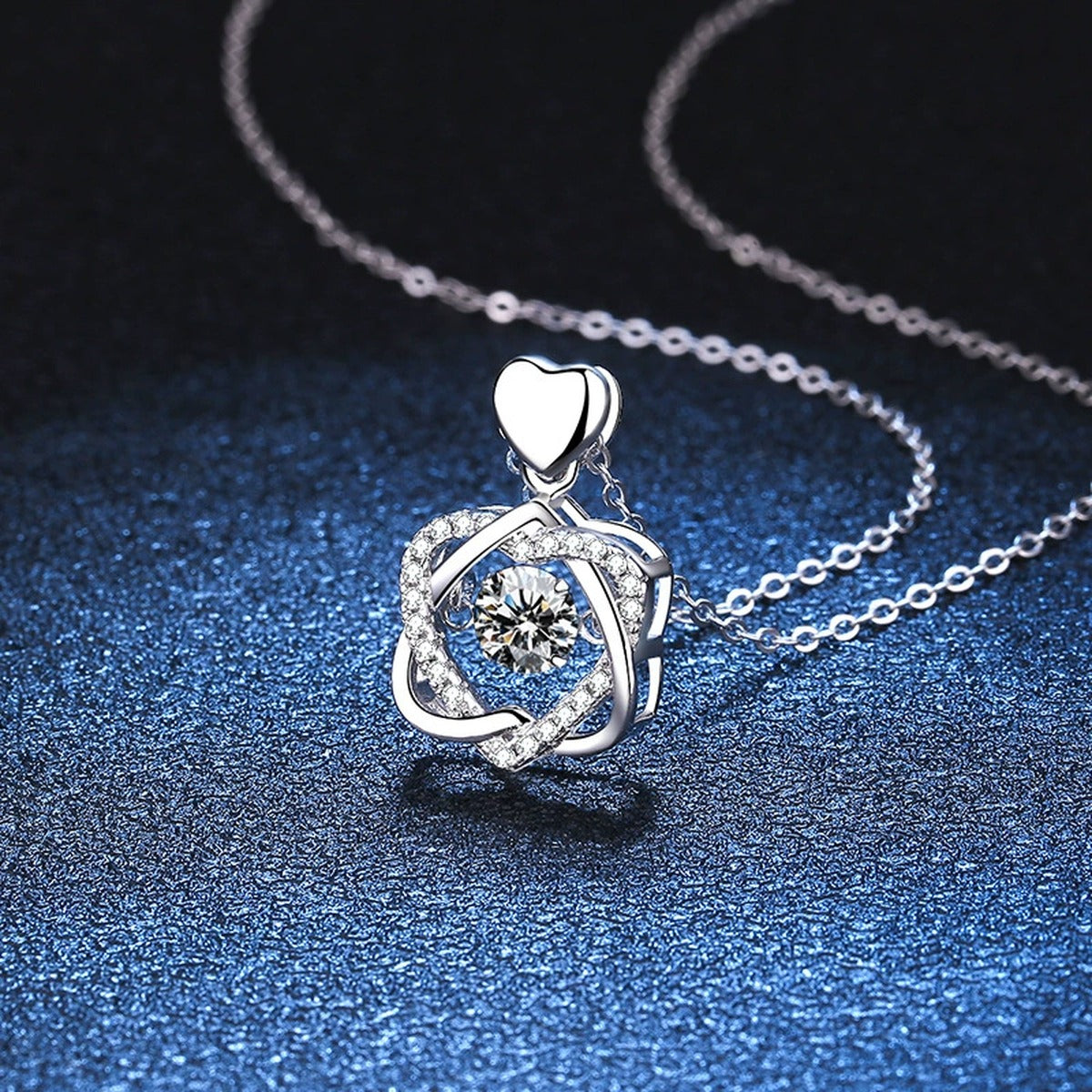 Floral Swirl Moissanite Pendant Necklace in Platinum-Plated S925 Sterling Silver blue background product view
