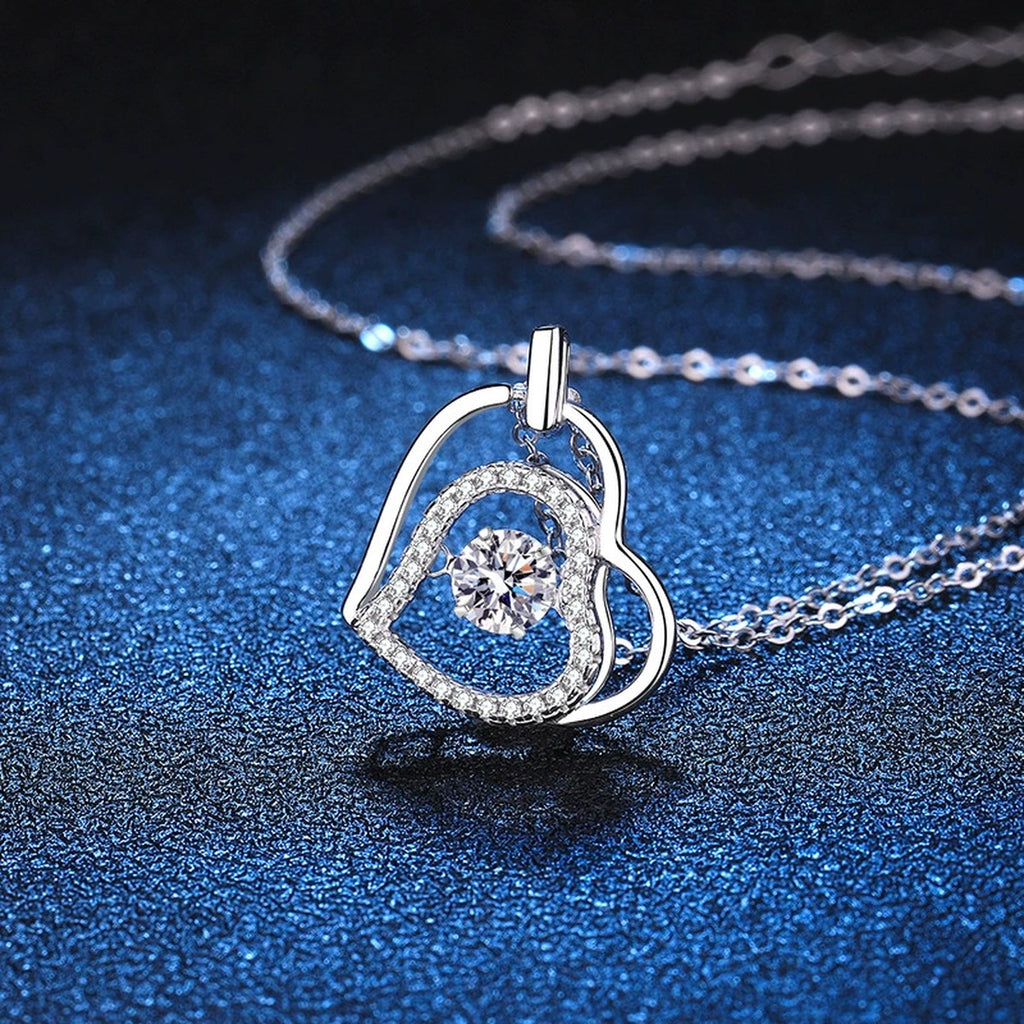 Heart Halo Moissanite Pendant Necklace in Platinum-Plated S925 Sterling Silver blue background angled detail view