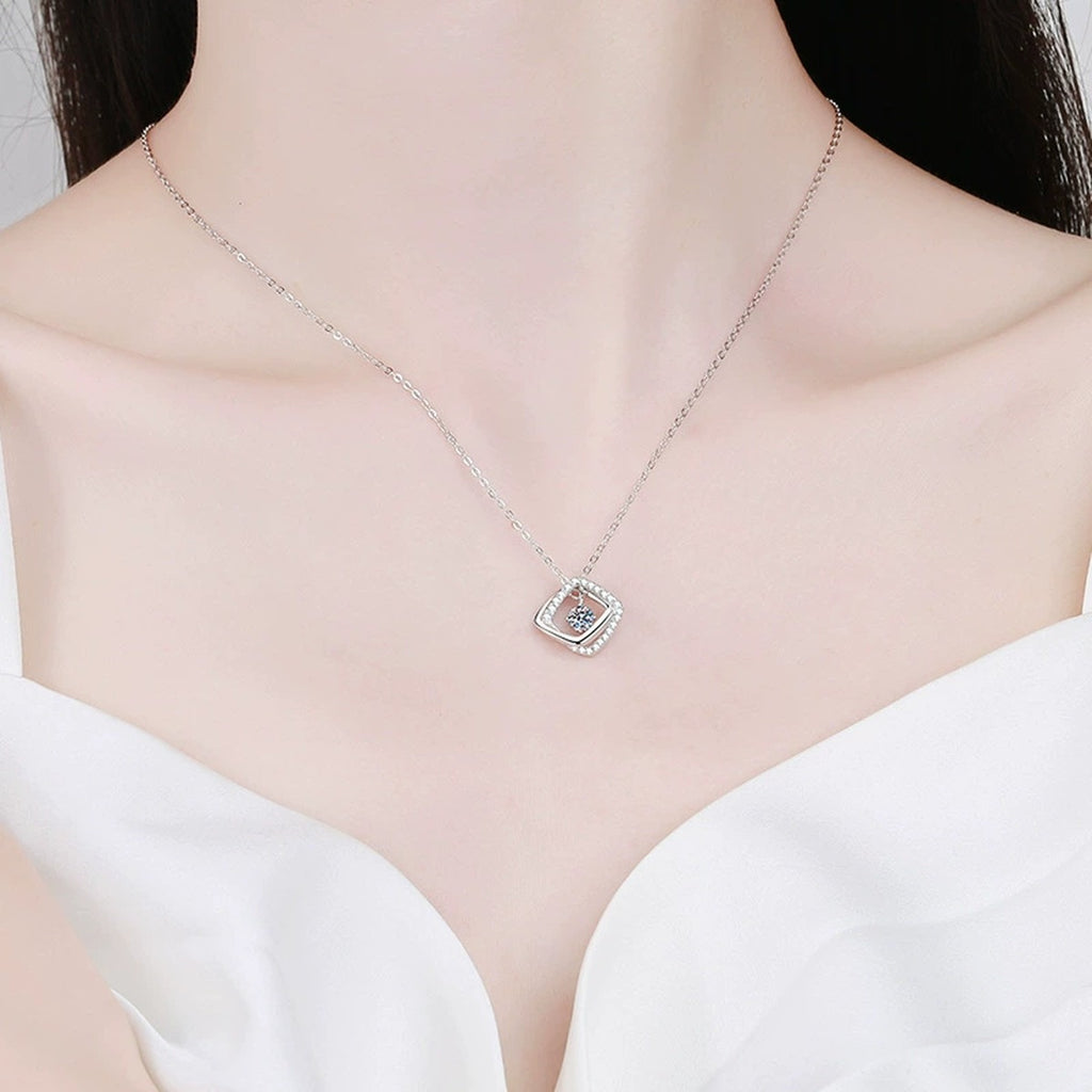 Geometric Halo Moissanite Pendant Necklace in Platinum-Plated S925 Sterling Silver worn on neckline by model