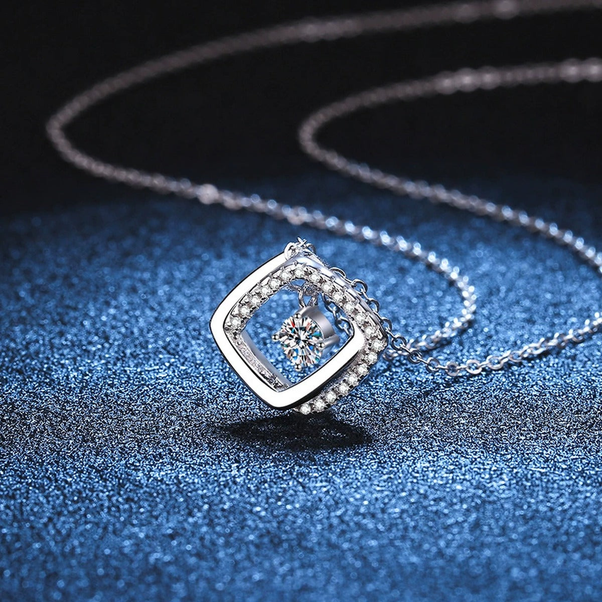 Geometric Halo Moissanite Pendant Necklace in Platinum-Plated S925 Sterling Silver blue background product view