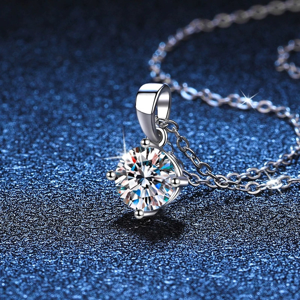 Round Moissanite Solitaire Pendant Necklace in Platinum-Plated S925 Sterling Silver blue background product view