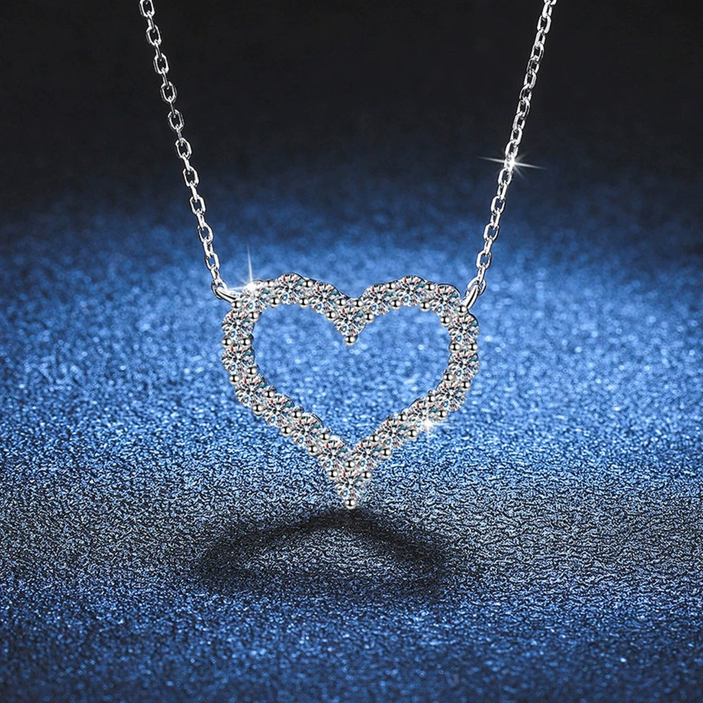 Heart Moissanite Pendant Necklace in White Gold-Plated S925 Sterling Silver blue background product view