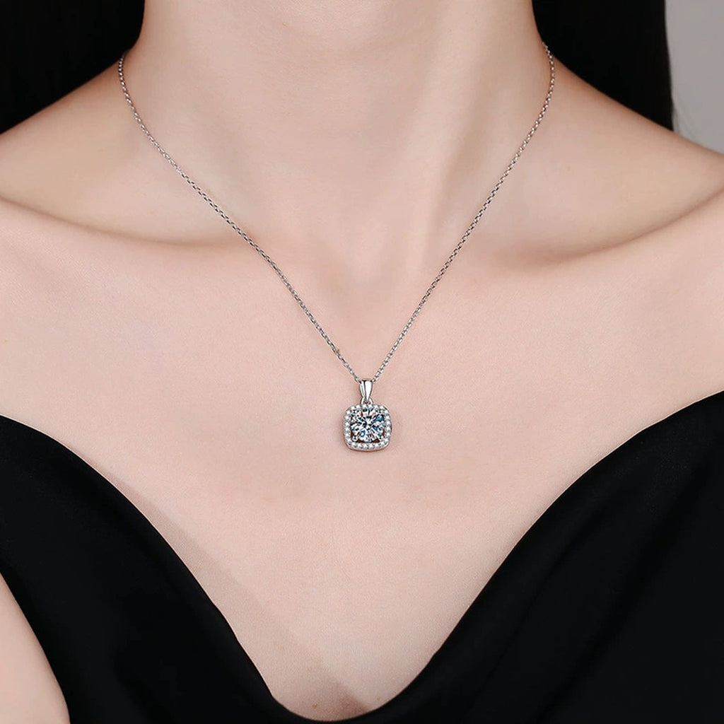 Round Moissanite Pendant Necklace in Platinum-Plated S925 Sterling Silver worn by model at neckline