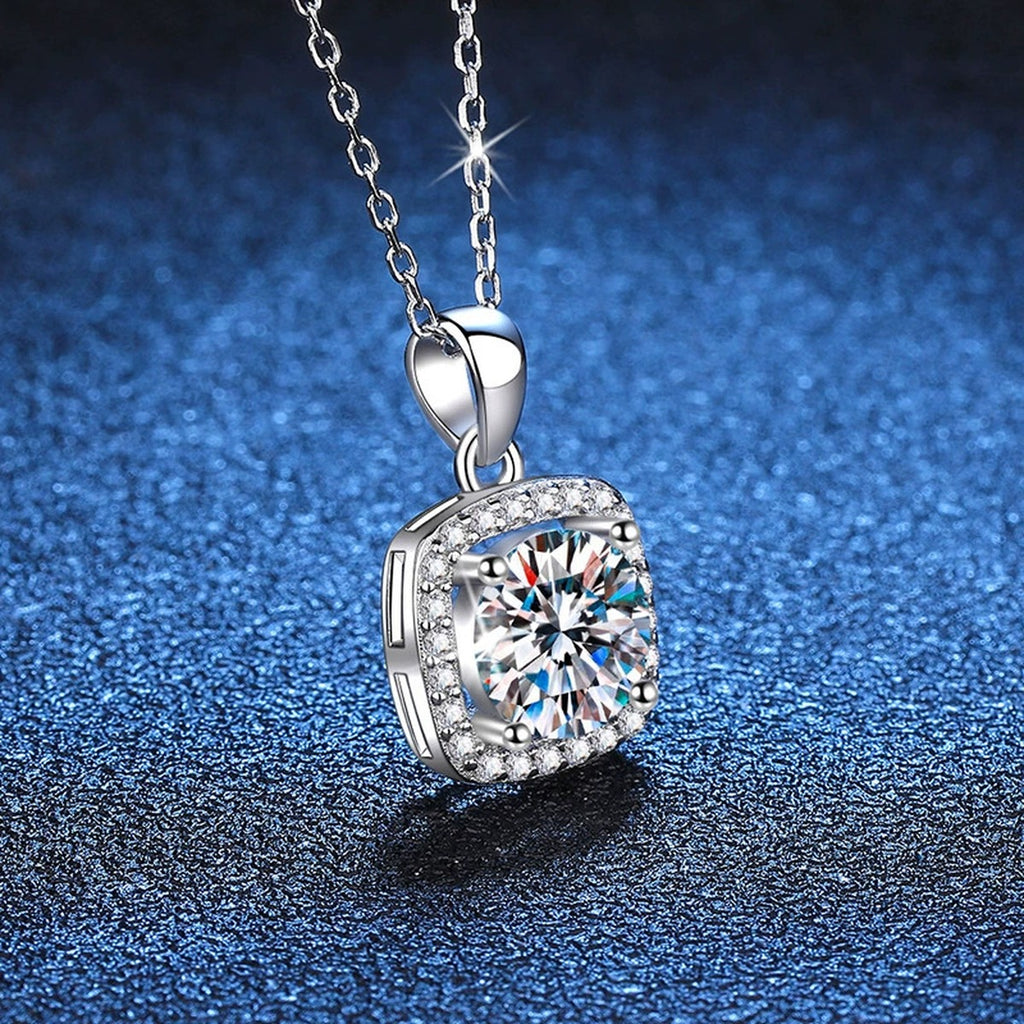 Round Moissanite Pendant Necklace in Platinum-Plated S925 Sterling Silver blue background product view