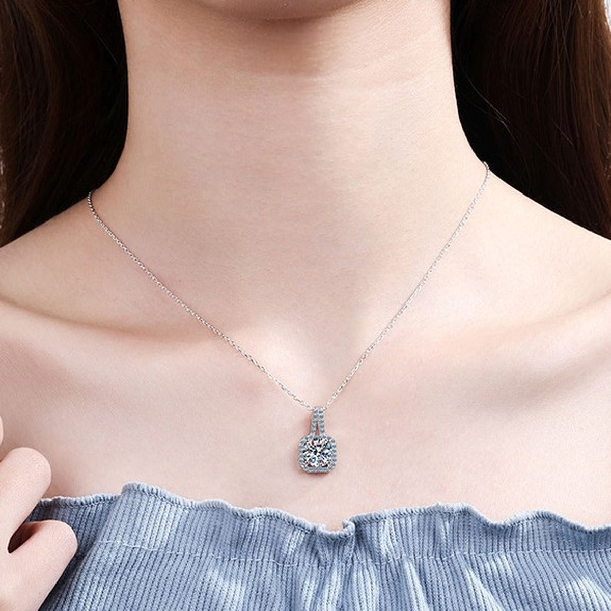 Round Moissanite Halo Pendant Necklace in White Gold-Plated S925 Sterling Silver worn by model at neckline