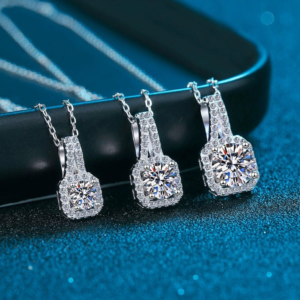 Round Moissanite Halo Pendant Necklace in White Gold-Plated S925 Sterling Silver blue background angled detail view