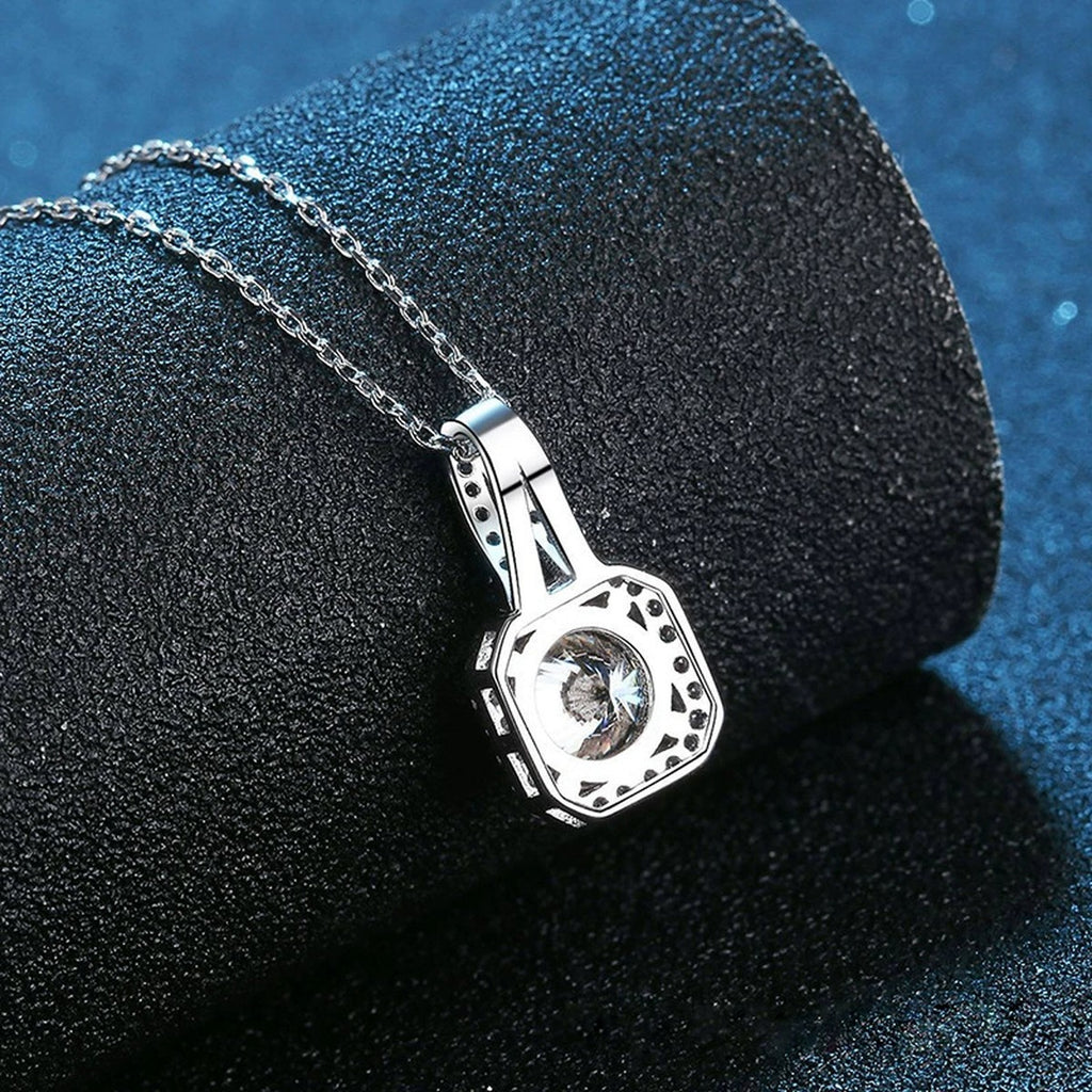 Round Moissanite Halo Pendant Necklace in White Gold-Plated S925 Sterling Silver blue background close-up view