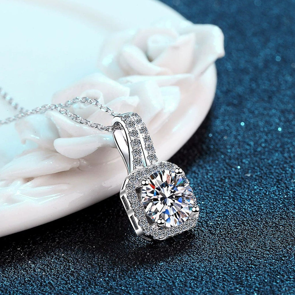 Round Moissanite Halo Pendant Necklace in White Gold-Plated S925 Sterling Silver blue background styling view