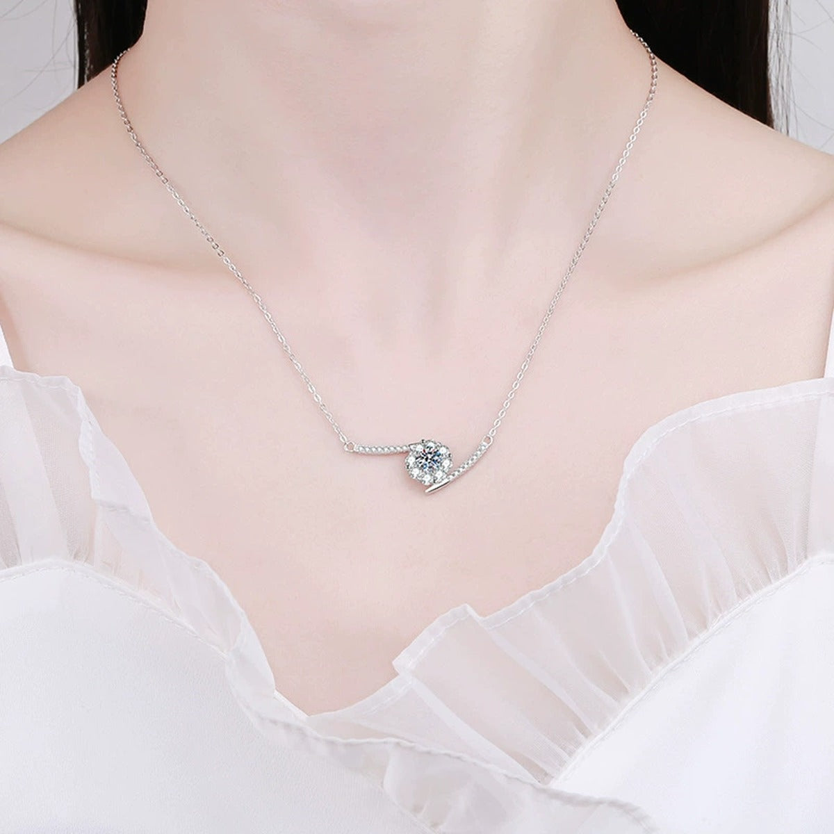 Curved Bar Moissanite Necklace in Platinum-Plated S925 Sterling Silver worn on neckline by model
