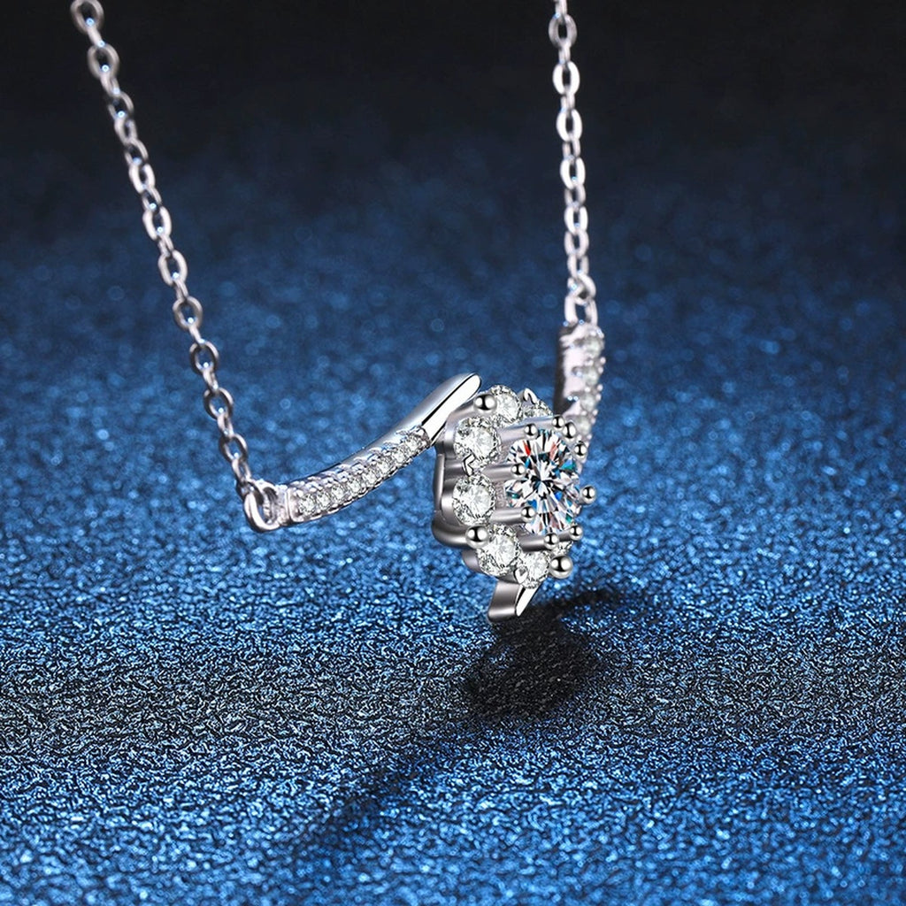 Curved Bar Moissanite Necklace in Platinum-Plated S925 Sterling Silver blue background close-up view
