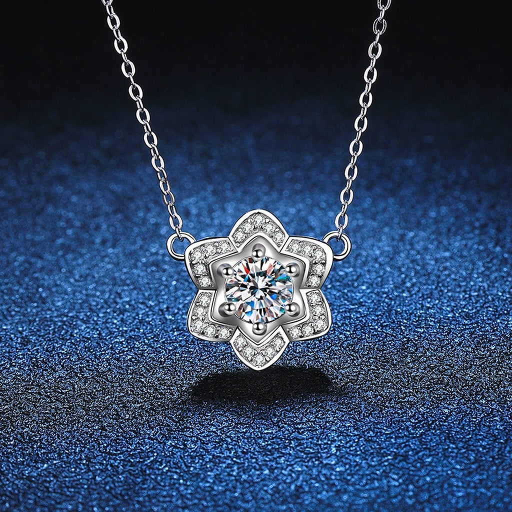 Floral Halo Moissanite Pendant Necklace in Platinum-Plated S925 Sterling Silver blue background close-up view